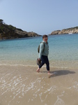 FZ028215 Jenni paddling on Cala Vedella beach.jpg